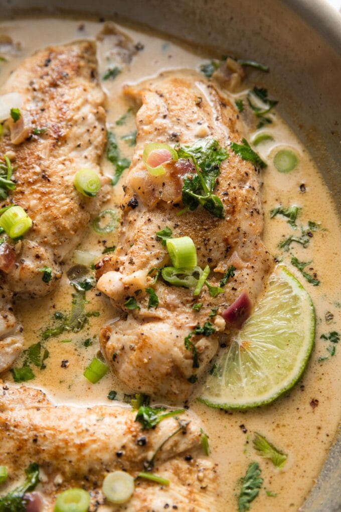 This Creamy Cilantro Lime Chicken skillet is a 30 minute, one-pan meal with major Southwest-inspired flavor and the most delicious light cream sauce. This is a family favorite quick weeknight dinner!