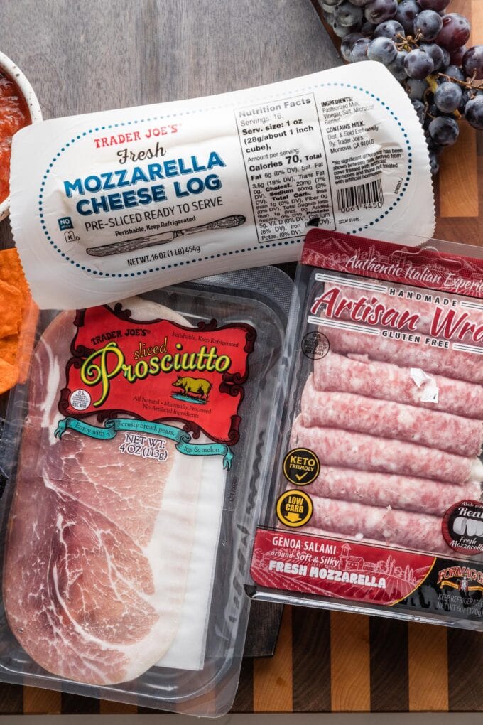 Packaged pre-sliced mozzarella log, prosciutto, and salami mozzarella roll-ups.