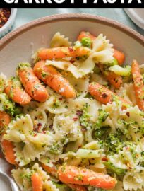Super simple and yet delicious, this easy Broccoli Carrot Pasta is total comfort food mixed with the colorful veggies we all need. Lemon, garlic, and a hint of red pepper wake up the flavors for a dinner everyone can feel good about.