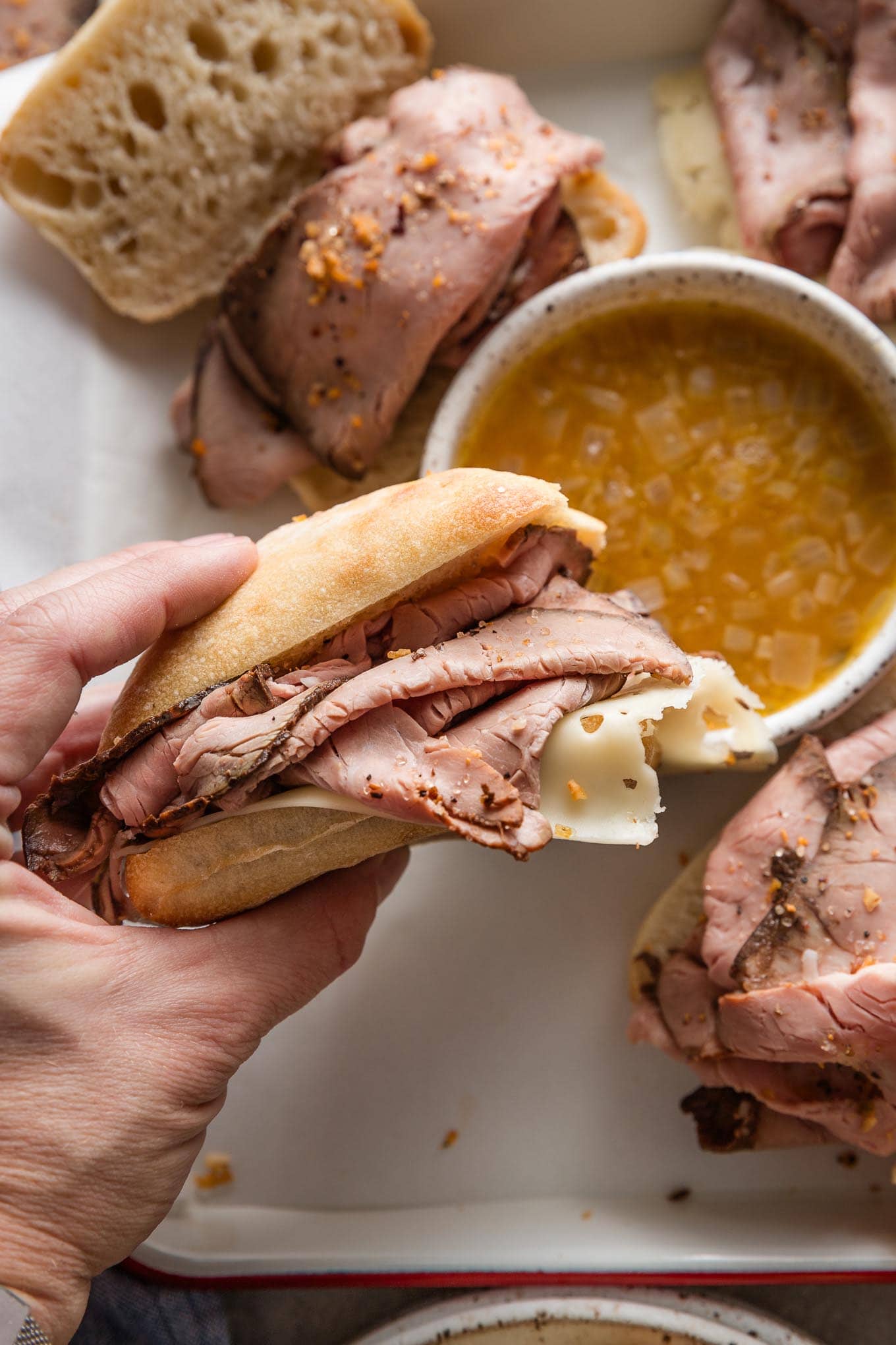 A small French dip sandwich made with deli roast beef and a quick homemade au jus.
