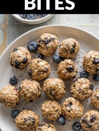 Quick and easy, these Blueberry Chia Protein Bites are made with old-fashioned oats, freeze-dried blueberries, honey, nut butter, and protein powder for a tasty on-the-go treat.