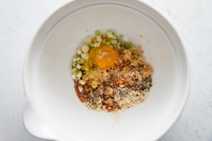 White bowl filled with Panko, egg, and seasonings.