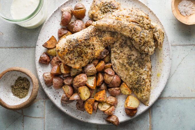 Chicken and potatoes pan-seared and remove to a plate.