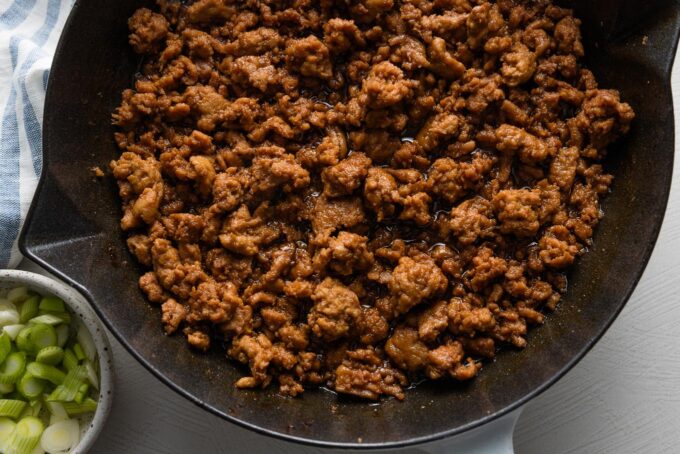 Ground chicken simmering in a sweet and tangy homemade sauce.