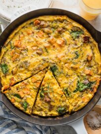 This simple Sweet Potato Frittata with sausage, cheese, and baby spinach is the most flavorful and satisfying breakfast or brunch. Serve it for friends, meal prep it for the week ahead, or pair it with a salad and enjoy for dinner - there’s literally no wrong way to frittata.