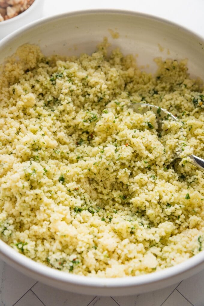 Couscous and peas tossed with a light basil dressing.
