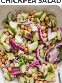 This Cucumber Chickpea Salad is fresh and easy to toss together. With a quick Greek-inspired dressing, it makes a great complement to any Mediterranean main dish, like meatballs, grilled chicken, or fish.