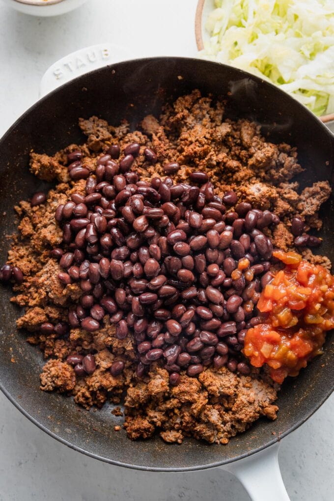 Black beans and salsa mixed into browned ground beef.