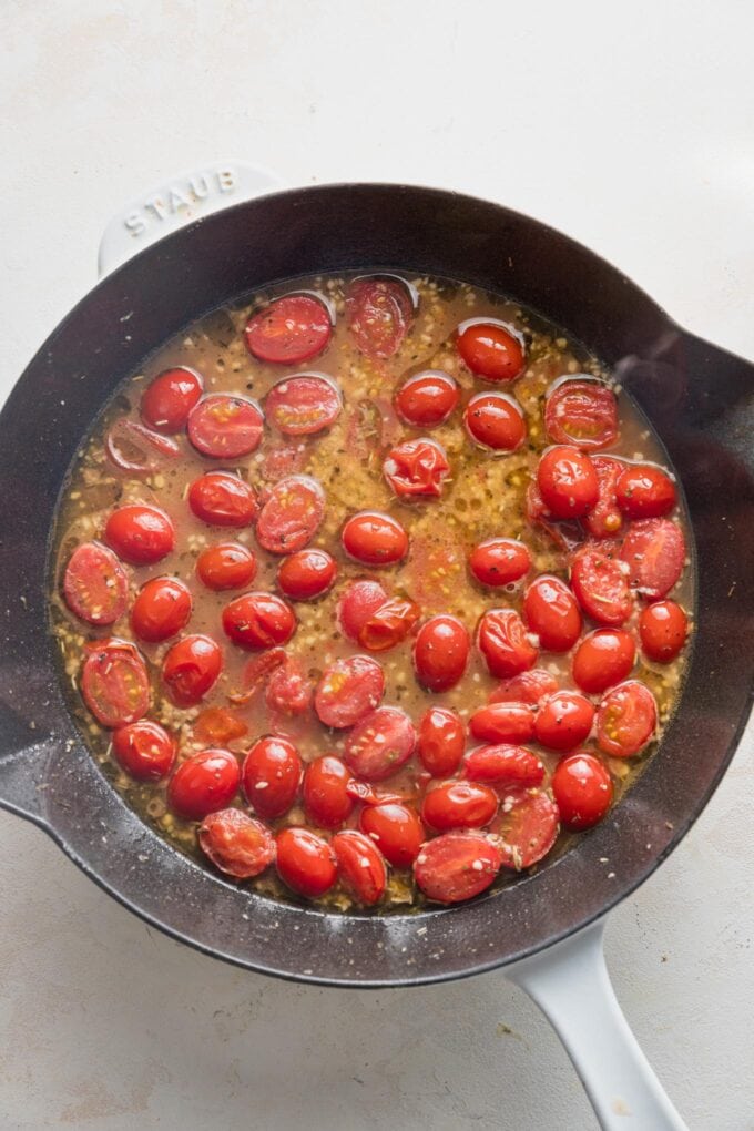 Light sauce with cherry tomatoes, slightly reduced.
