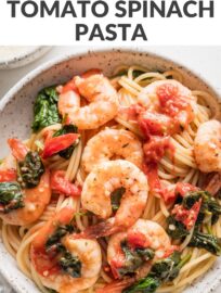 This colorful Tomato Spinach Shrimp Pasta is full of fresh ingredients tossed in a deliciously light garlic sauce. It can be on the table in about 25 minutes, making it a favorite for busy weeknights, but the flavors are very worthy of guests or special occasions.