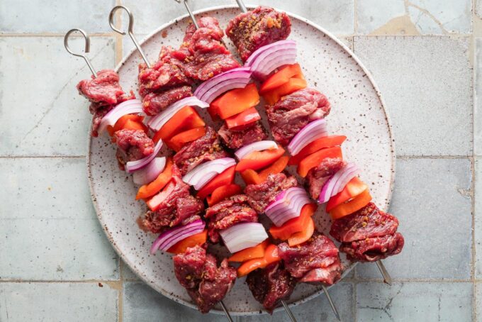 Steak kabobs seasoned and prepped for the grill.