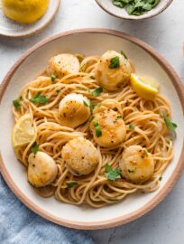 This simple recipe for pan-seared scallops with pasta is the perfect start if you feel uneasy about cooking scallops at home. It's got a buttery, garlicky, shallot-infused sauce, and step-by-step instructions to help you enjoy a restaurant-quality meal at home.