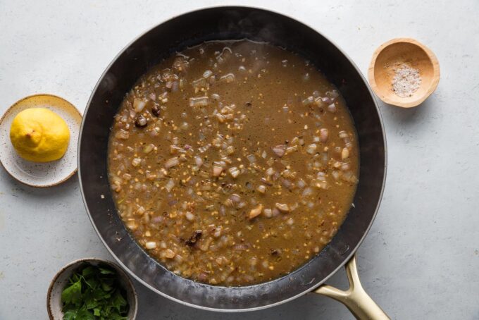 A quick pan sauce with minced shallot and garlic.