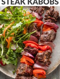 Fire up the grill for these super easy steak kabobs with peppers and onions! Juicy, tender steak cubes are quickly seasoned and skewered with colorful veggies for a simple, crowd-pleasing, warm-weather dinner. No marinating required. Whether you're hosting a backyard BBQ or just craving something quick and flavorful, these kabobs are a must-try!