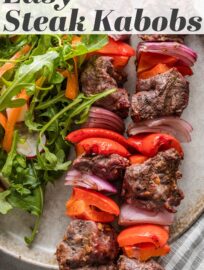 Fire up the grill for these super easy steak kabobs with peppers and onions! Juicy, tender steak cubes are quickly seasoned and skewered with colorful veggies for a simple, crowd-pleasing, warm-weather dinner. No marinating required. Whether you're hosting a backyard BBQ or just craving something quick and flavorful, these kabobs are a must-try!