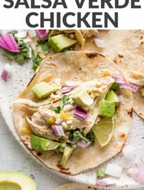 Enlist your trusty slow cooker for these super easy salsa verde chicken tacos! Humble chicken breasts are juicy and flavorful when cooked low and slow in a sauce of vibrant salsa verde, green chiles, and a blend of everyday spices. Five minutes prep time and minimal clean-up. Add your favorite toppings for a fun, delicious family dinner!