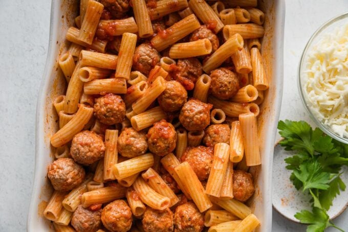 Pasta stirred into marinara-meatball mixture.