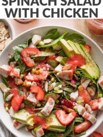 A beautiful, flavorful Strawberry Spinach Salad with Chicken is a vibrant lunch or dinner-worthy bowl, packed with dark leafy greens, juicy berries, crunchy almonds, and creamy goat cheese. We especially love pairing it with an easy homemade strawberry vinaigrette.