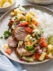 Slather lean pork tenderloin with a quick blend of everyday spices for incredible flavor, grill or roast, then pair with a bright pineapple salsa for a dinner that feels fresh and satisfying. This is equally terrific for a quick weeknight meal or casually-elegant dinner with friends.