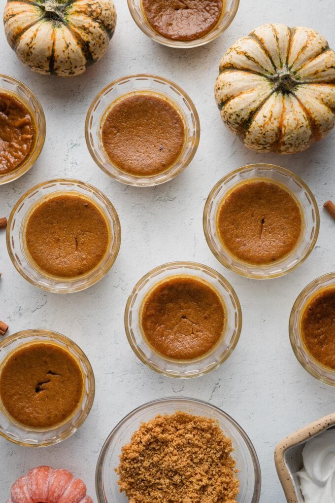 Mini pumpkin custards, cooling.