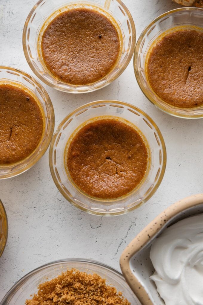 Close up of a mini pumpkin custard baked in a small glass Pyrex.