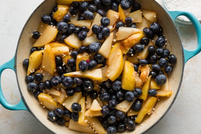 Tapioca pearls and blueberries stirred into softened pears.