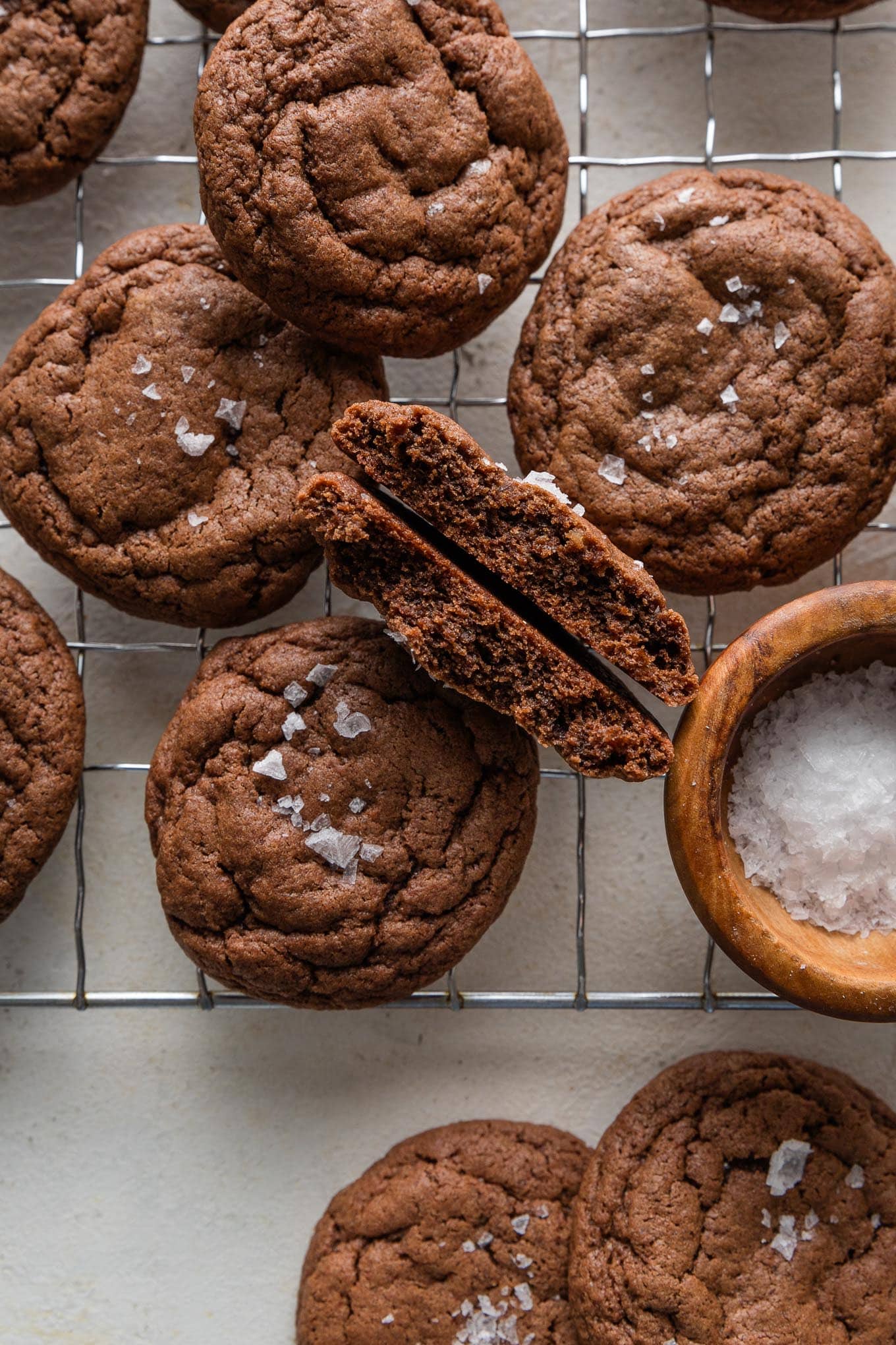 Close up of a chocolate cookie split in half to reveal the fudgy interior.