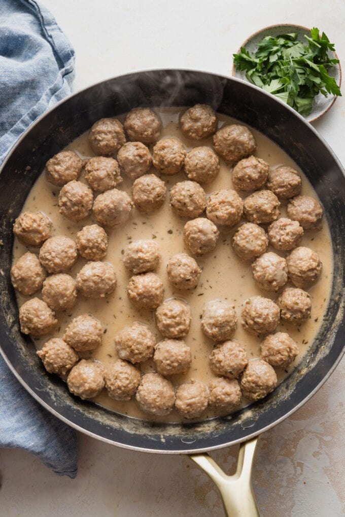 Cooked meatballs in sauce.