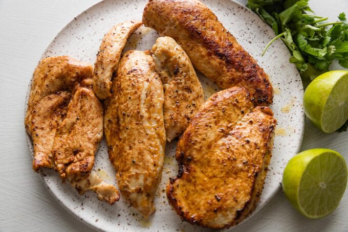 Pan-fried, Tajin-seasoned chicken breasts.