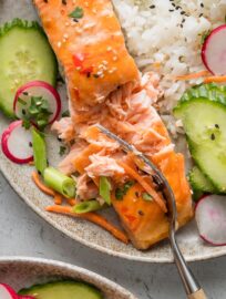 Close up of flaky salmon filet roasted with Thai sweet chili sauce.