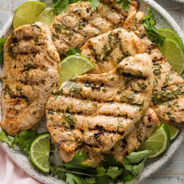 Large plate full of grilled cilantro lime chicken.