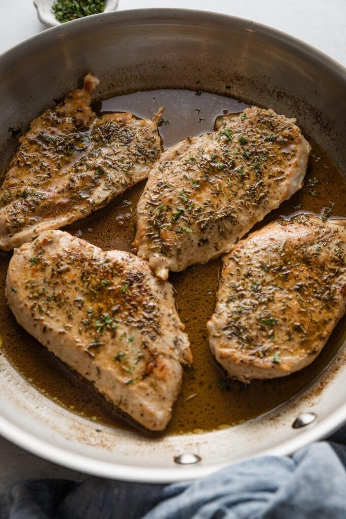 Chicken breasts returned to a skillet with a quick balsamic pan sauce.