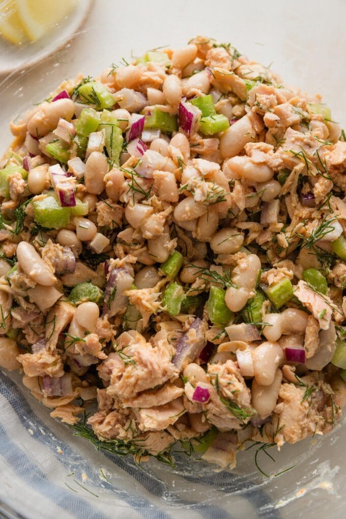 Close up of a lemon dill tuna salad in a large prep bowl.