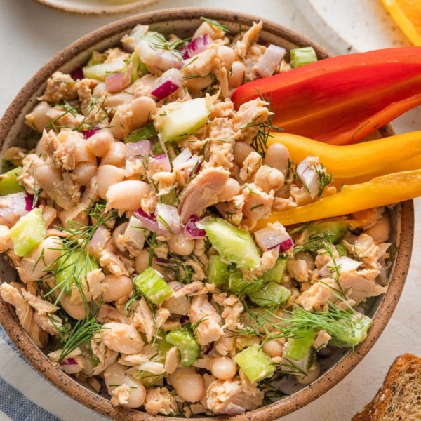 Fresh lemon and bright dill are the perfect seasonings to lift an everyday tuna salad from good to great. With a tangy yet light Greek yogurt-based dressing and plenty of crisp veggies for texture, this lemon dill tuna salad is a reliable lunch you can pile over salad greens, into a sandwich, or scoop up with crackers for simple satisfaction.