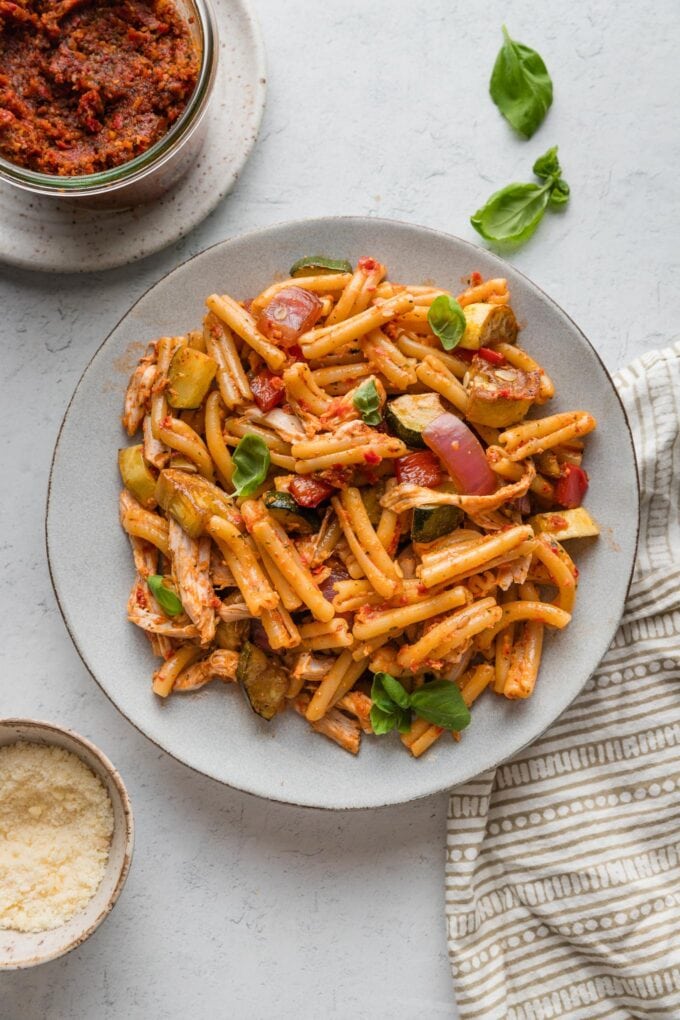 Plate of sun-dried tomato pesto pasta.