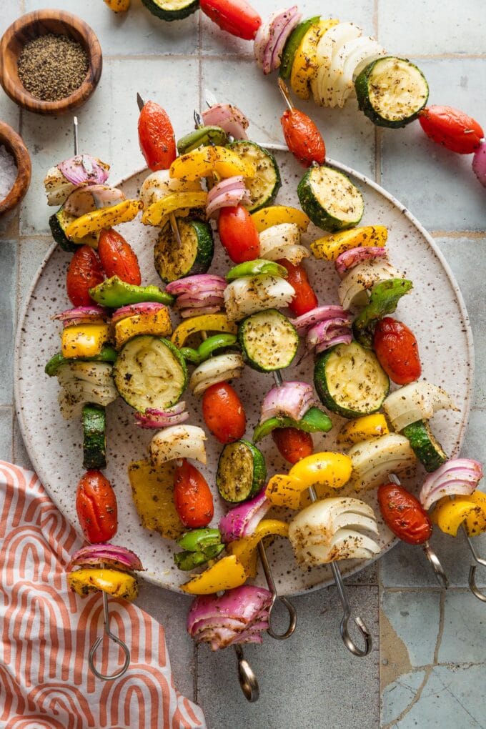 Plate filled with super easy grilled veggie skewers.