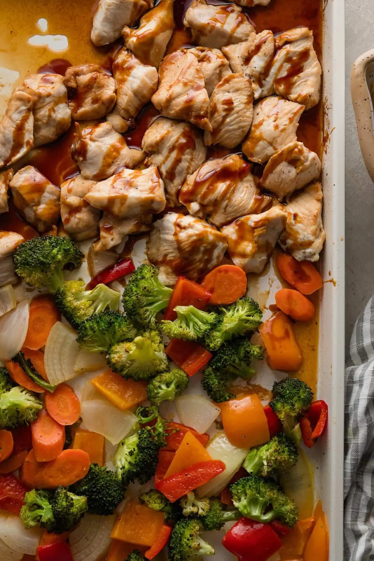 Teriyaki chicken sheet pan removed from the oven.